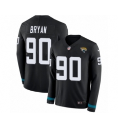 Men's Nike Jacksonville Jaguars #90 Taven Bryan Limited Black Therma Long Sleeve NFL Jersey